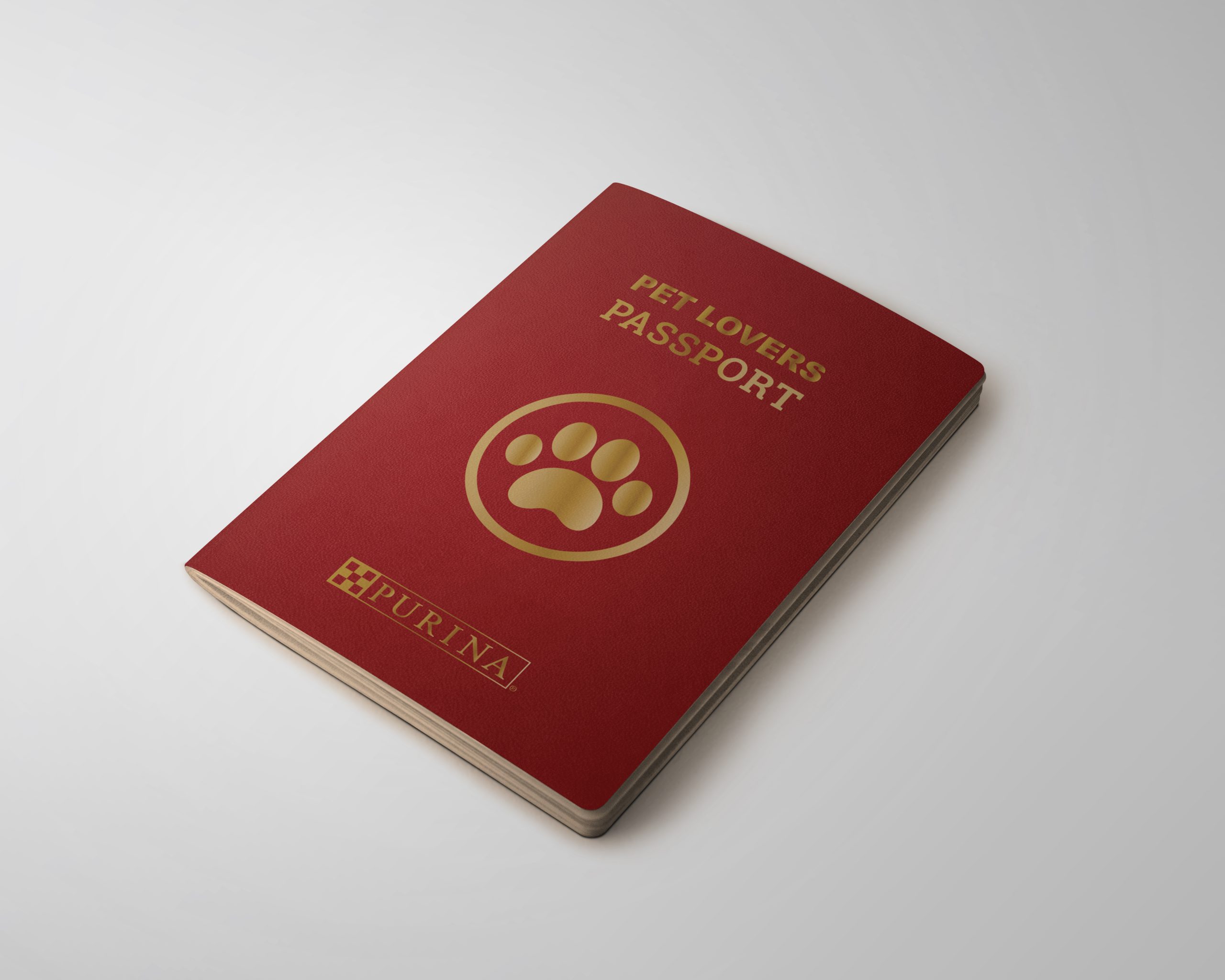 Purina “Pet lovers passport” with dog’s footprint on the cover. Purina "Pet lovers passport" with dog's footprint on the cover.